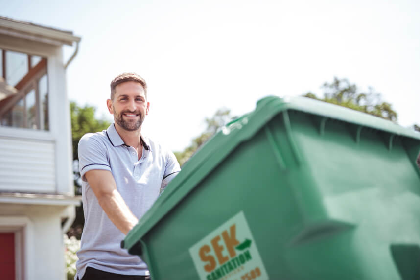 Man with SEK trash bin